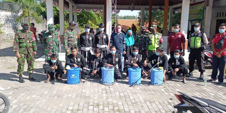 Upaya Pemutusan Mata Rantai Covid-19 Pemdes Tlemang Lakukan Vaksinasi, Bagi Masker dan Penyemprotan Desinfektan