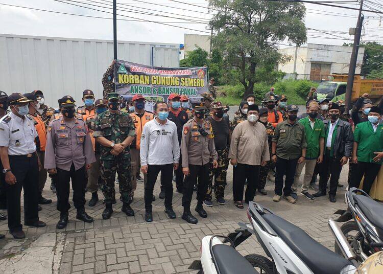 BANSER Satkoryon Kecamatan Pakal Kerjasama dengan LPMK Babat Jerawat Peduli Korban Semeru