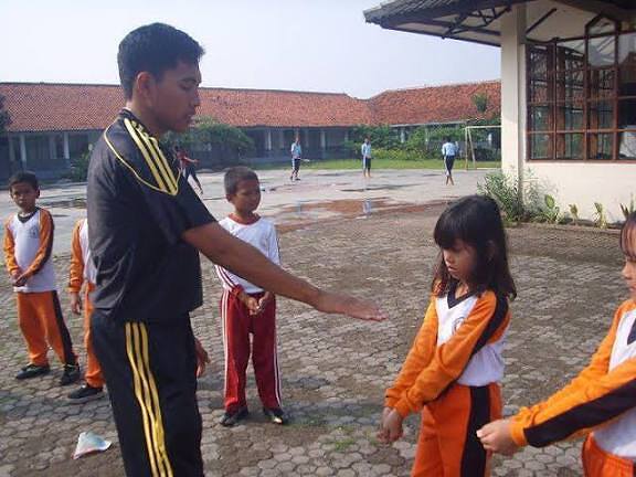 Peran Guru Olga sebagai Ujung Tombak Pembentukan Karakter Bela Negara di Sekolah